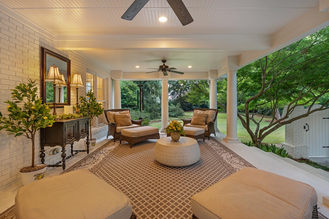 The rear covered porch above the pool