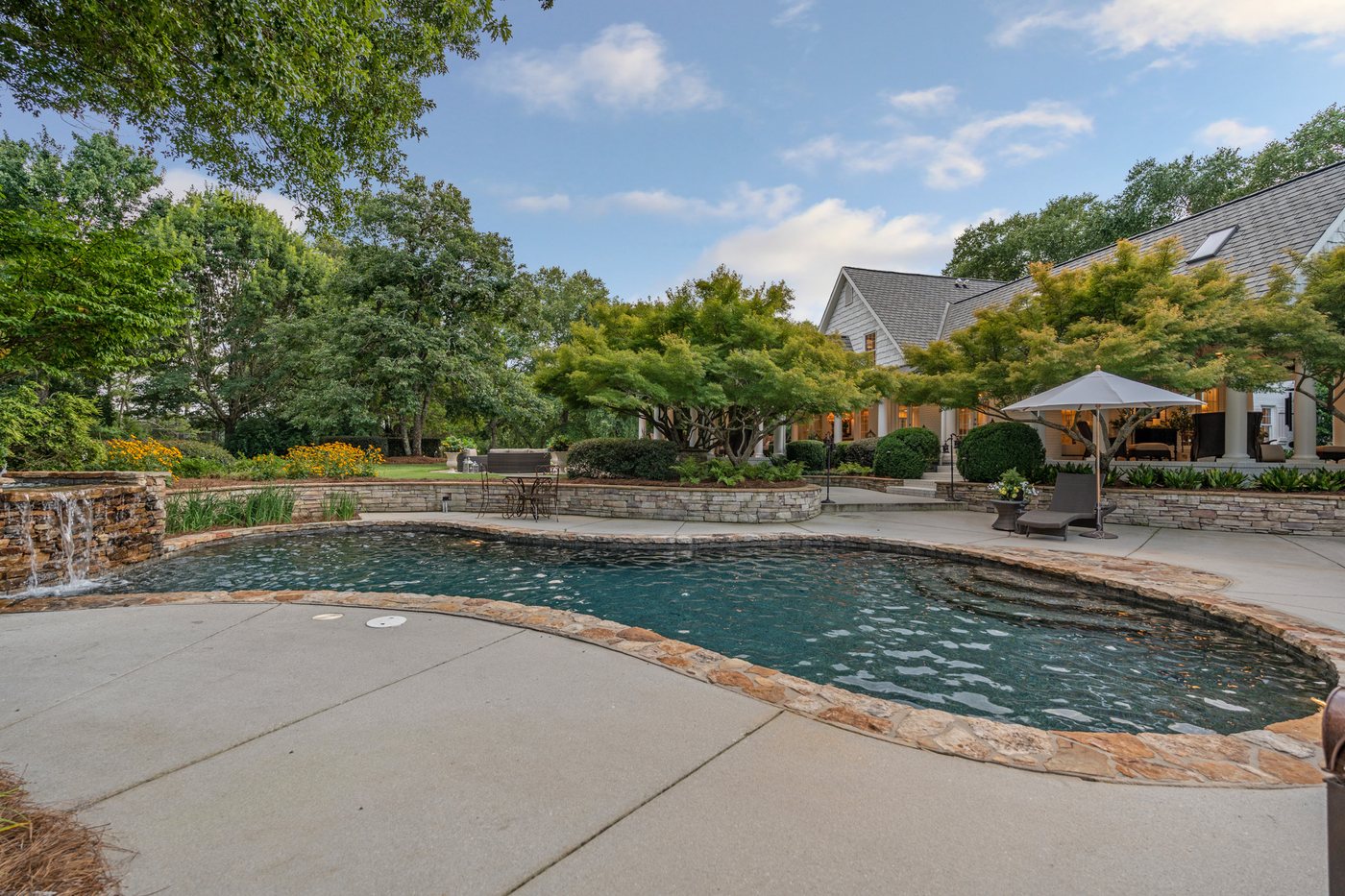 The pool, waterfall and terrace